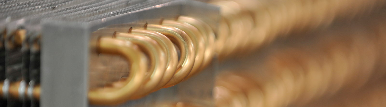 Close-up of custom copper fin-and-tube coil construction