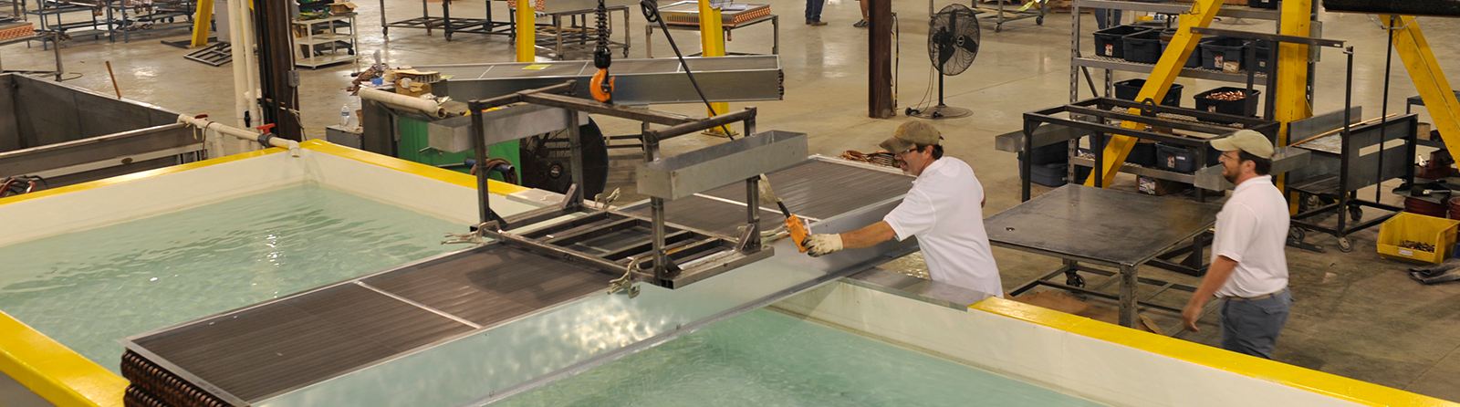 Custom coil undergoing pressure and leak testing in our facility
