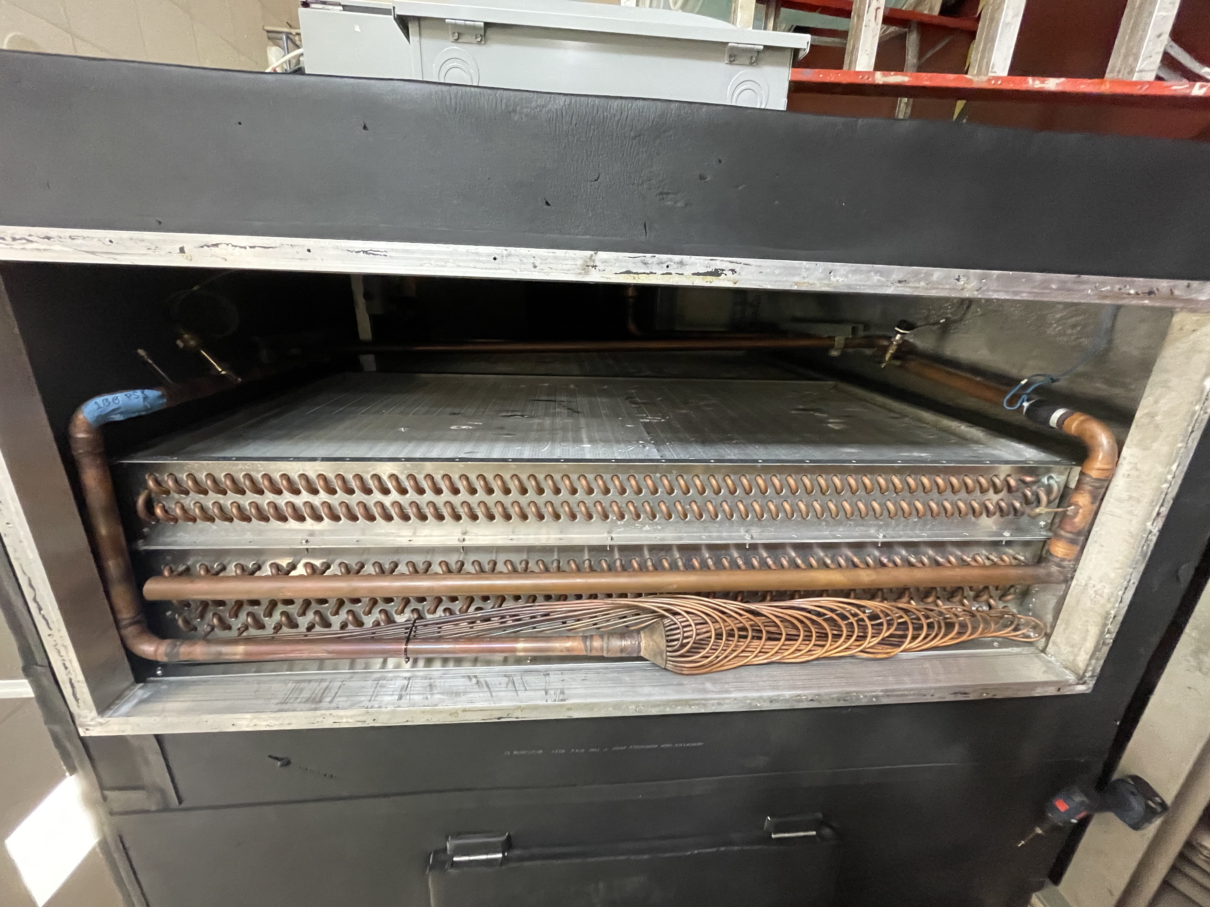 Custom coil installed and pressure-tested in a commercial air handling unit