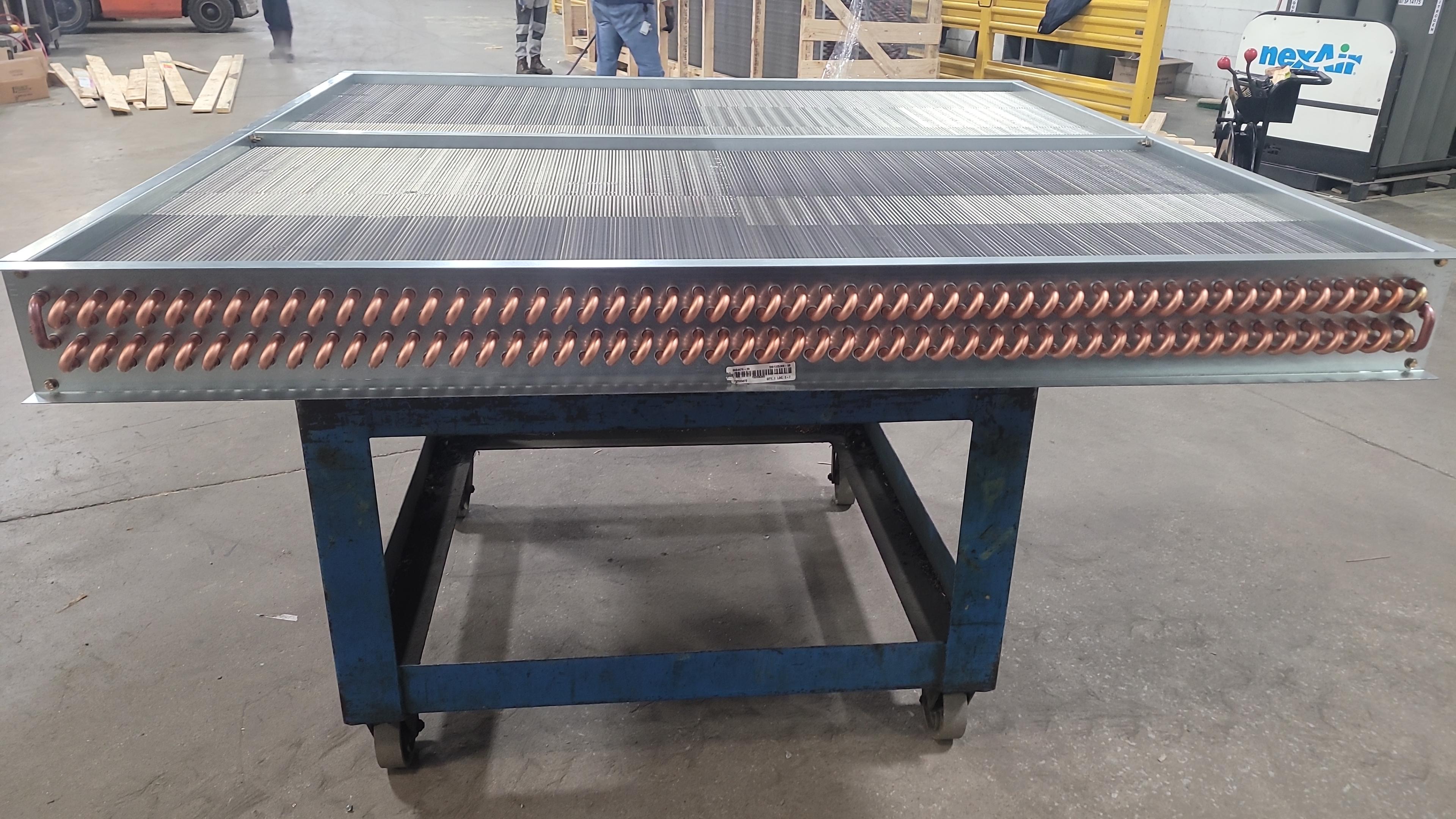 Custom coil assembly with dual copper headers ready for shipment